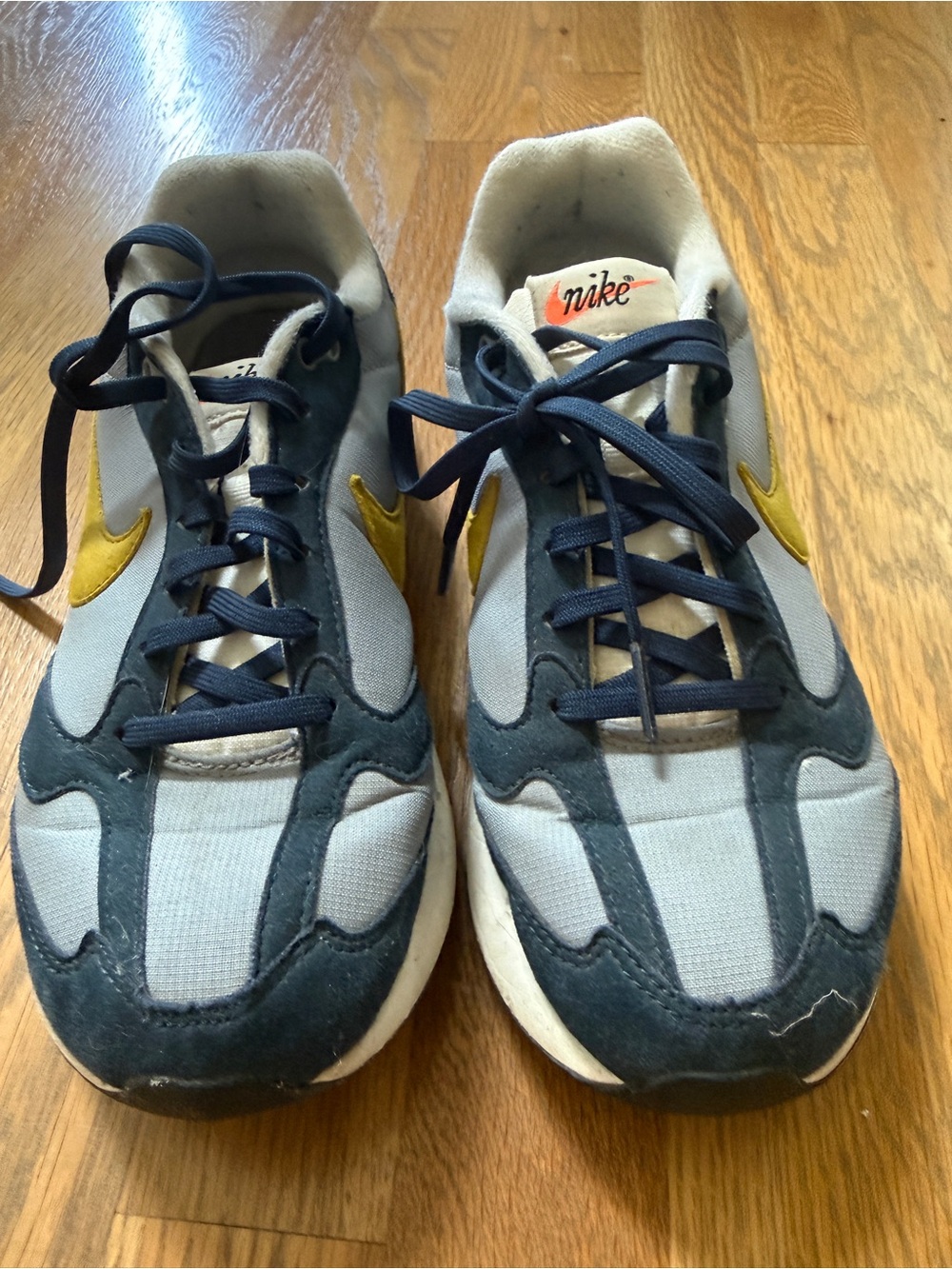 Nike White and Navy Kids Sneakers with Black Swoosh Tag